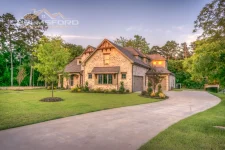 Large detached house with multiple pitched roof sections